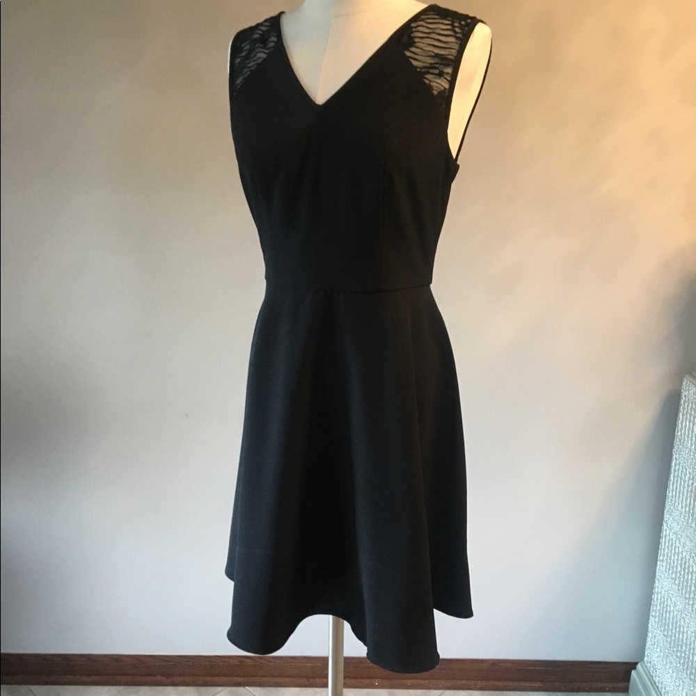 Little black dress WHITE HOUSE BLACK MARKET cocktail dress size 10. A-line style